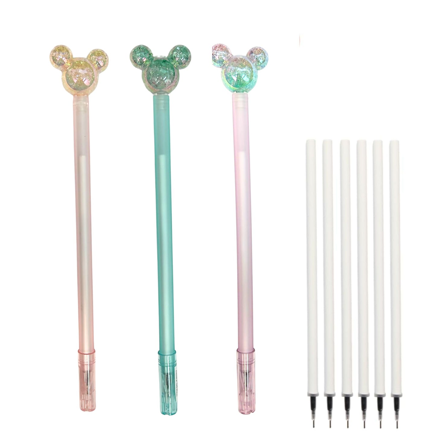 Three decorative pens with interchangeable tips on a white background
