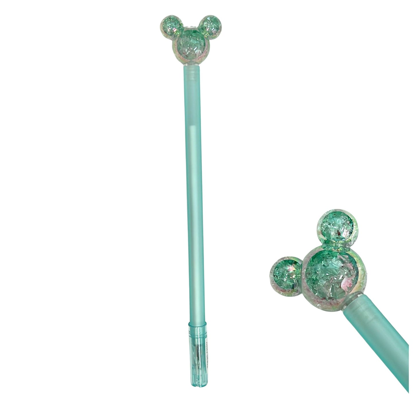 Two turquoise pens with decorative ends on a white background