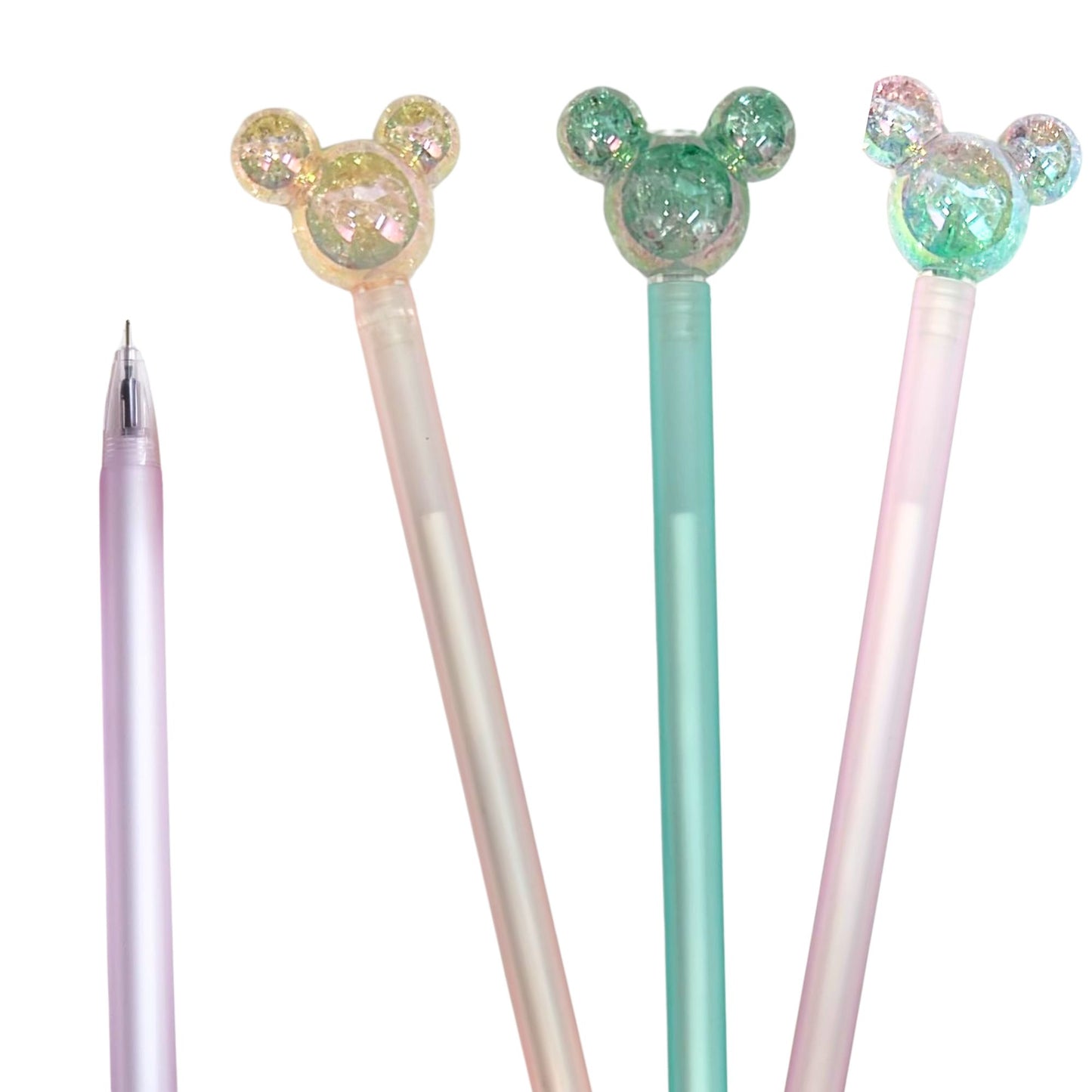 Three pens with colorful, glittery Mickey Mouse ear tops on a white background