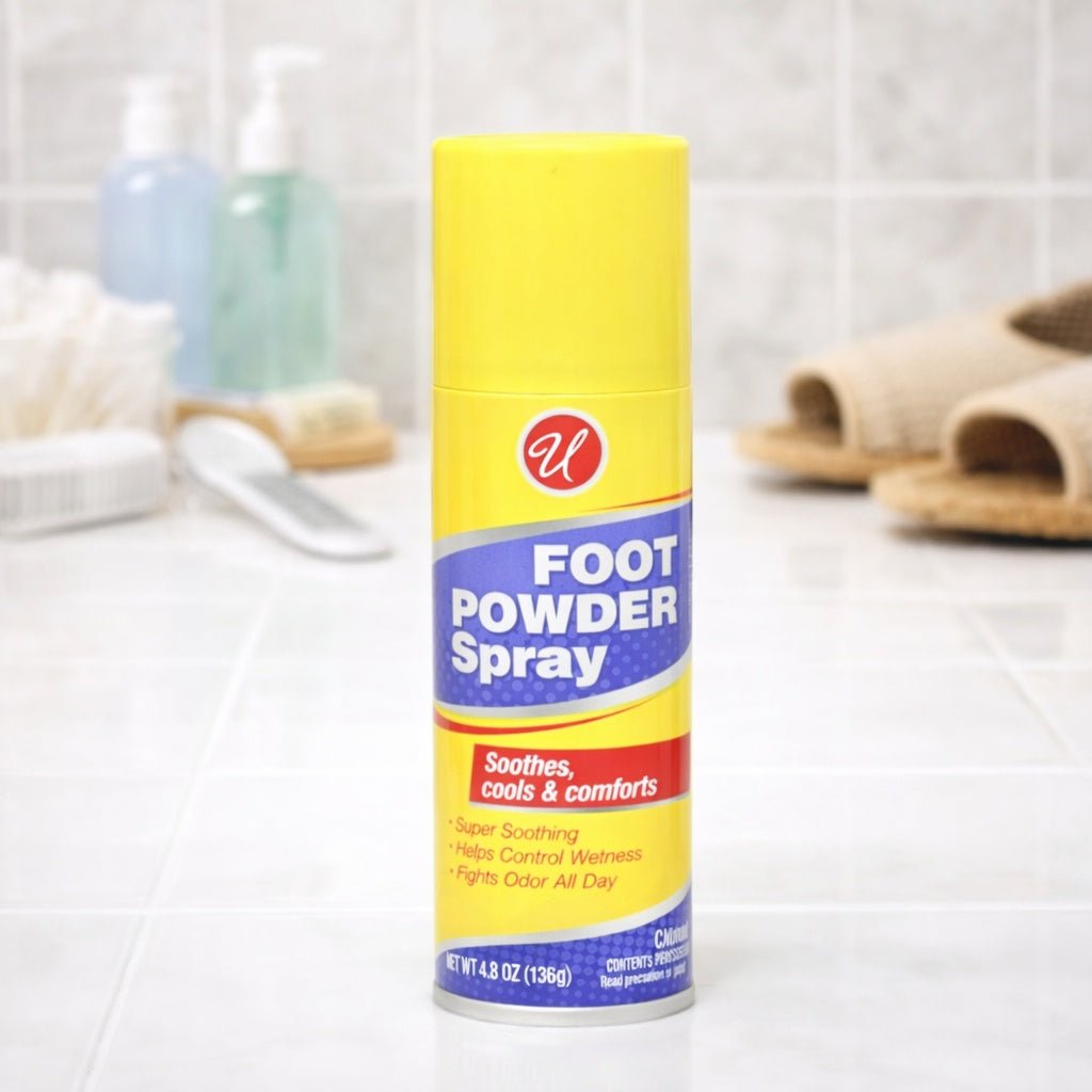 Foot powder spray can on a bathroom counter with blurred background