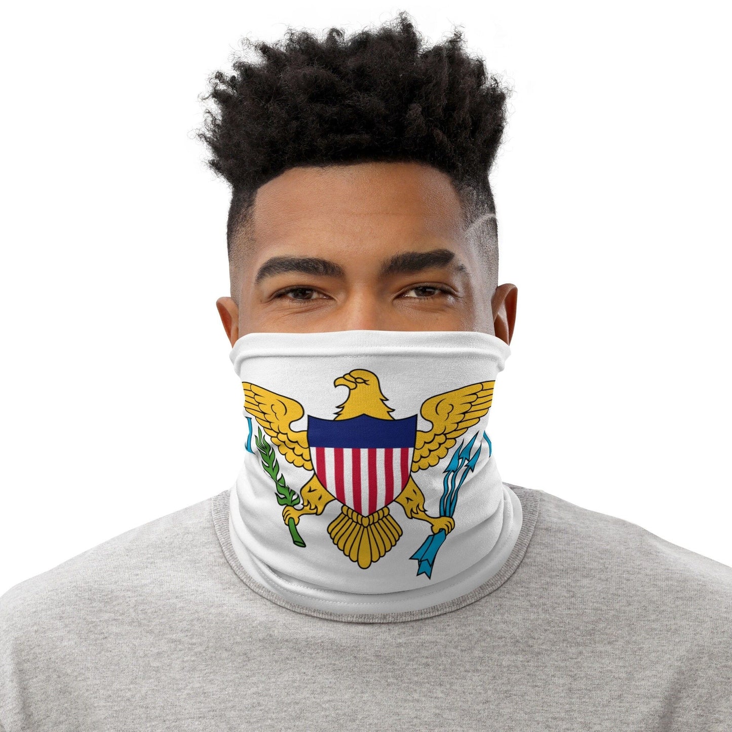 Person wearing a neck gaiter with an eagle emblem design on a white background