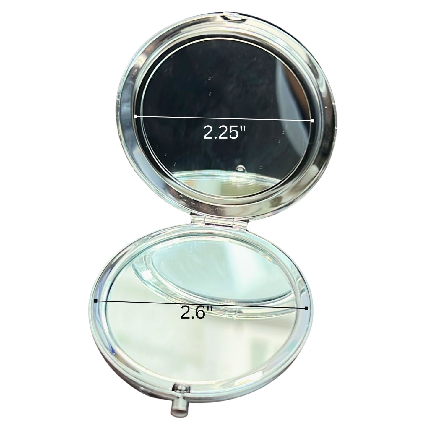 Compact mirror with measurements on a white background