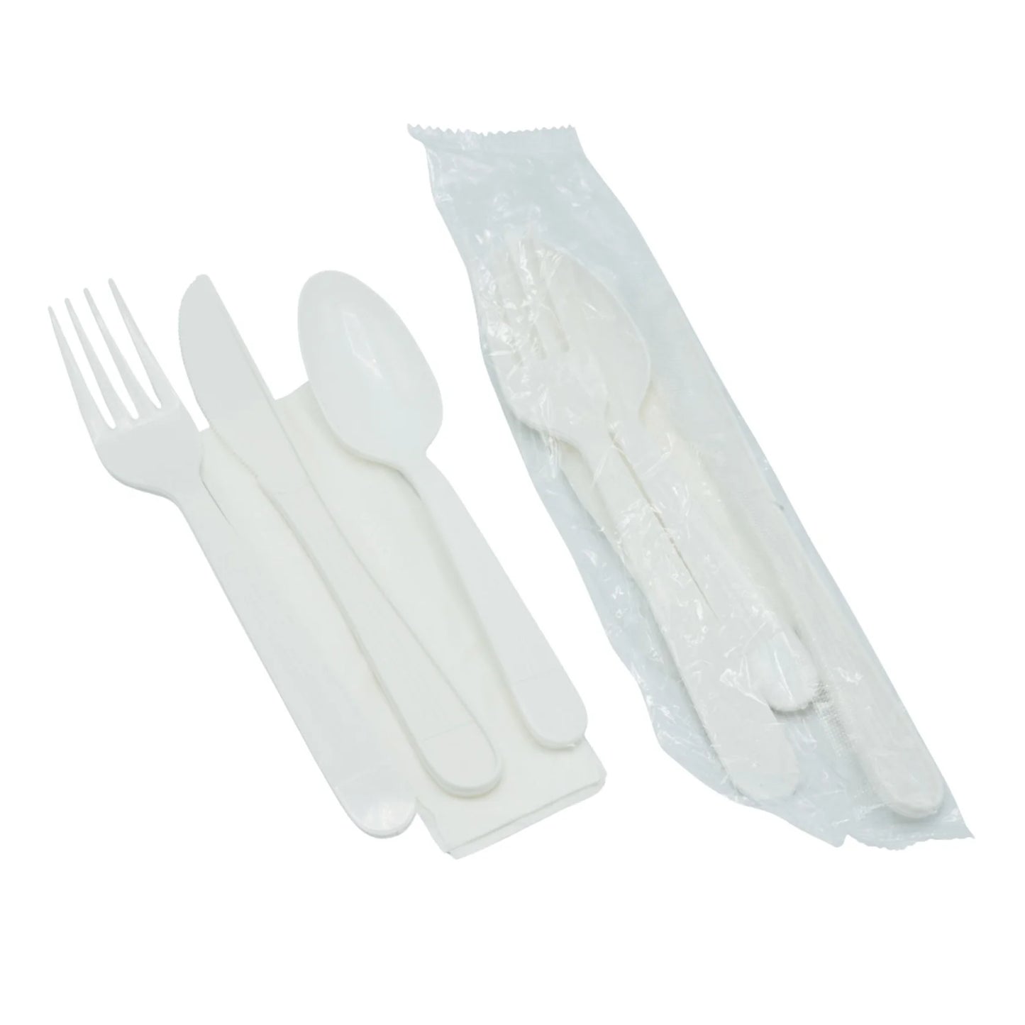 Set of white plastic cutlery including fork, knife, and spoon on a white background.