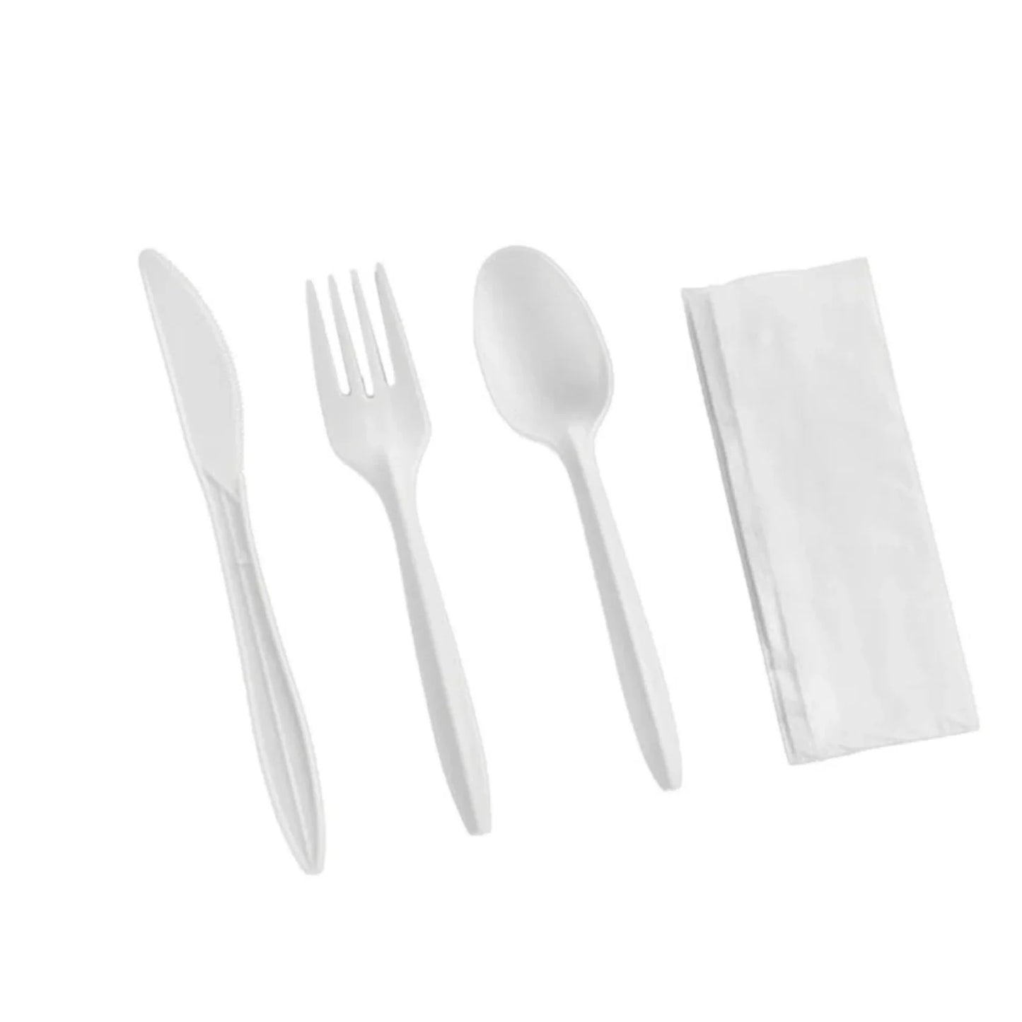 Set of white plastic cutlery and napkin on a white background