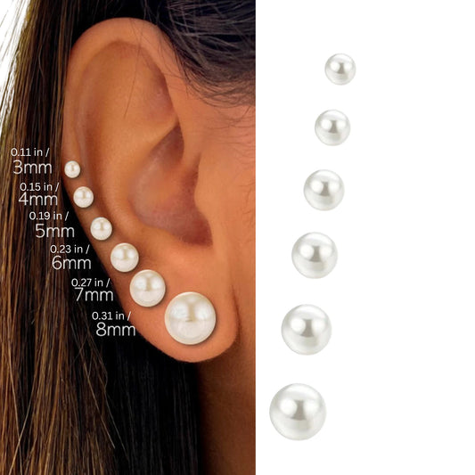 Pearl earrings displayed on an ear with size measurements.