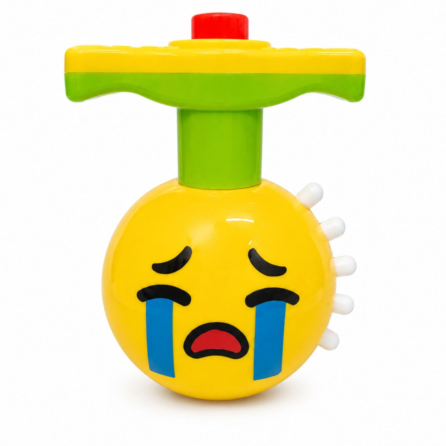 A yellow crying emoji toy with blue tears, a green neck, a yellow handle, and a red button on top, photographed on a white background.