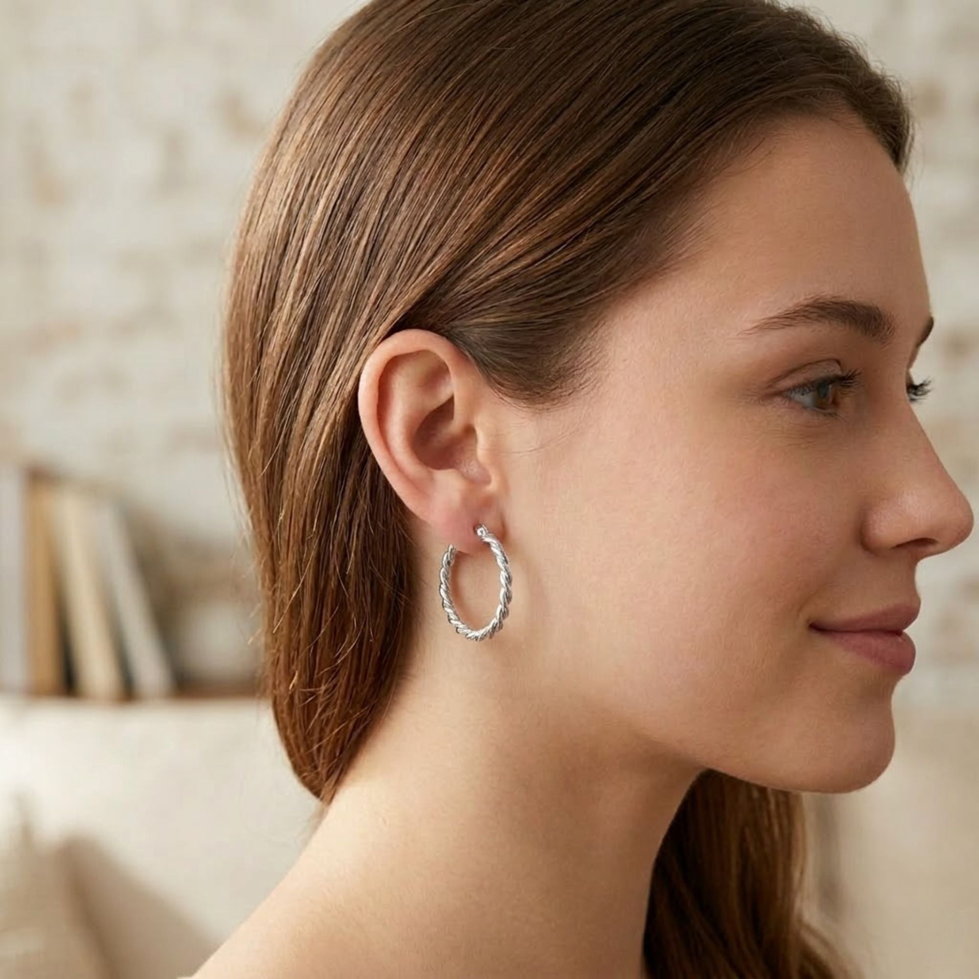 1.25" Silver Twisted Hoop Earrings for Women Textured Classic Style lifestyle use image
