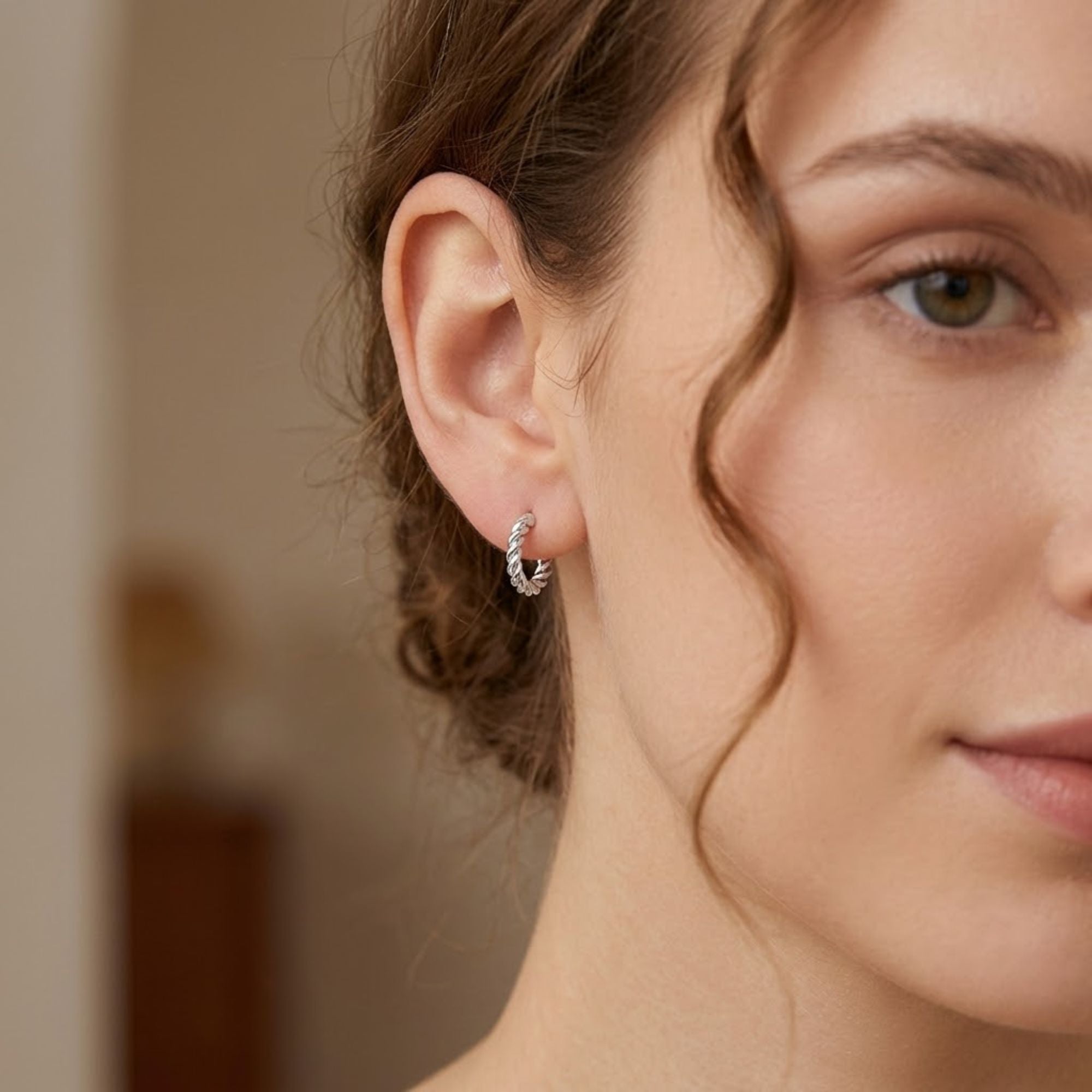 0.25" Stainless Steel Twisted Hoop Earrings Classic Minimal Hoops lifestyle use image