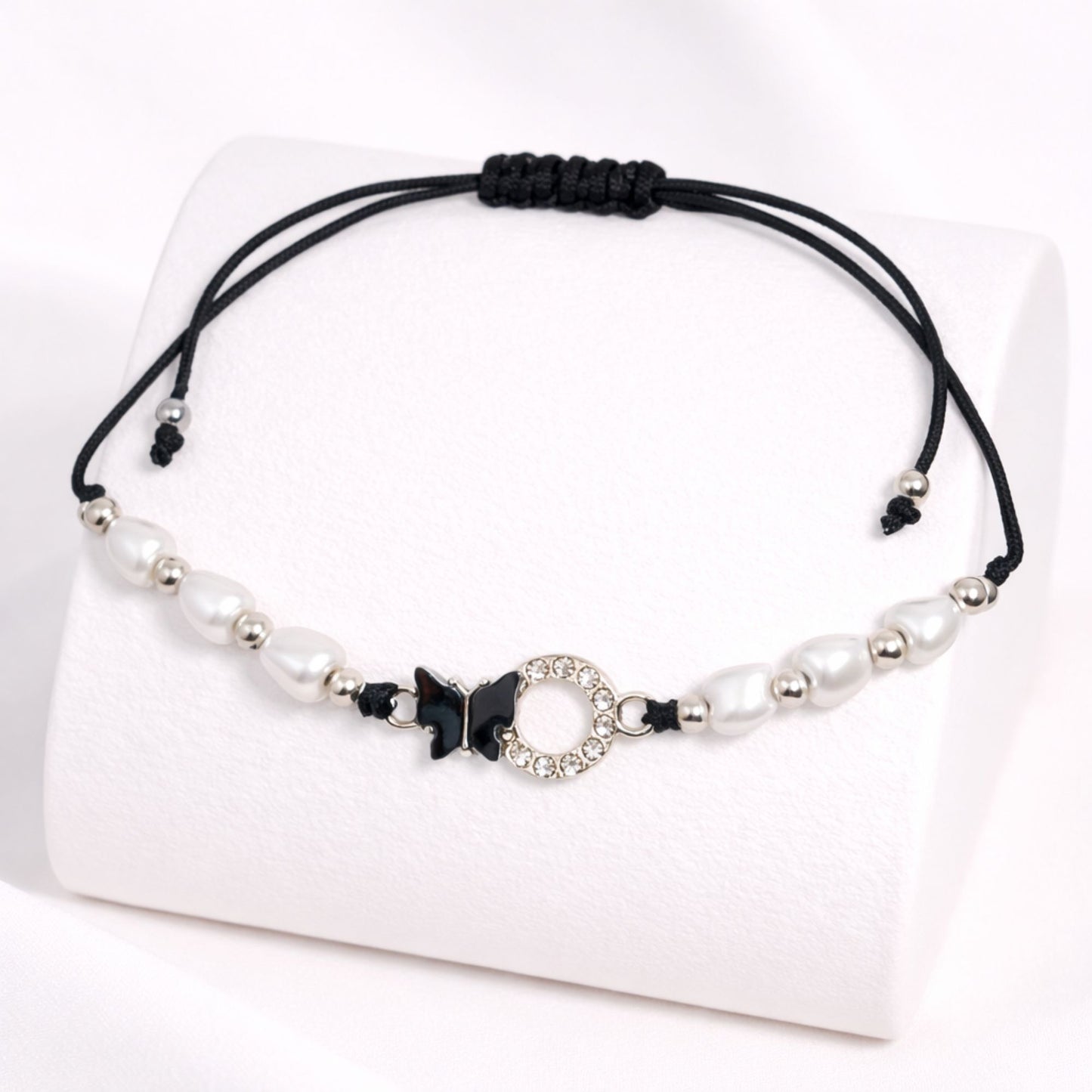 Black and white beaded bracelet on a white background
