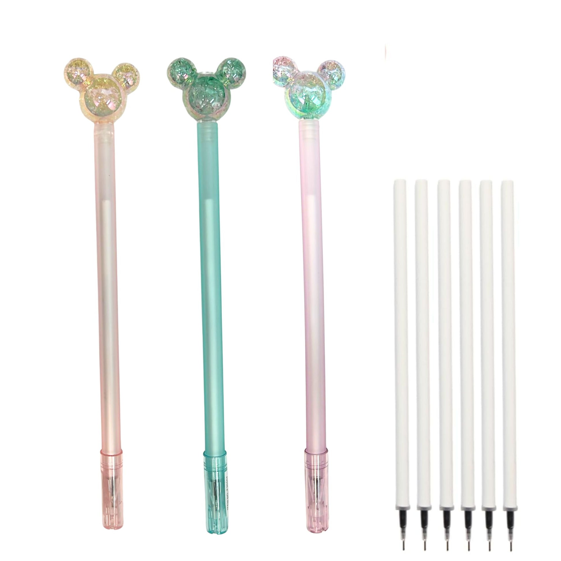 Three decorative pens with interchangeable tips on a white background
