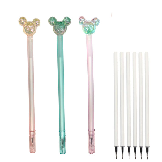 Three decorative pens with interchangeable tips on a white background