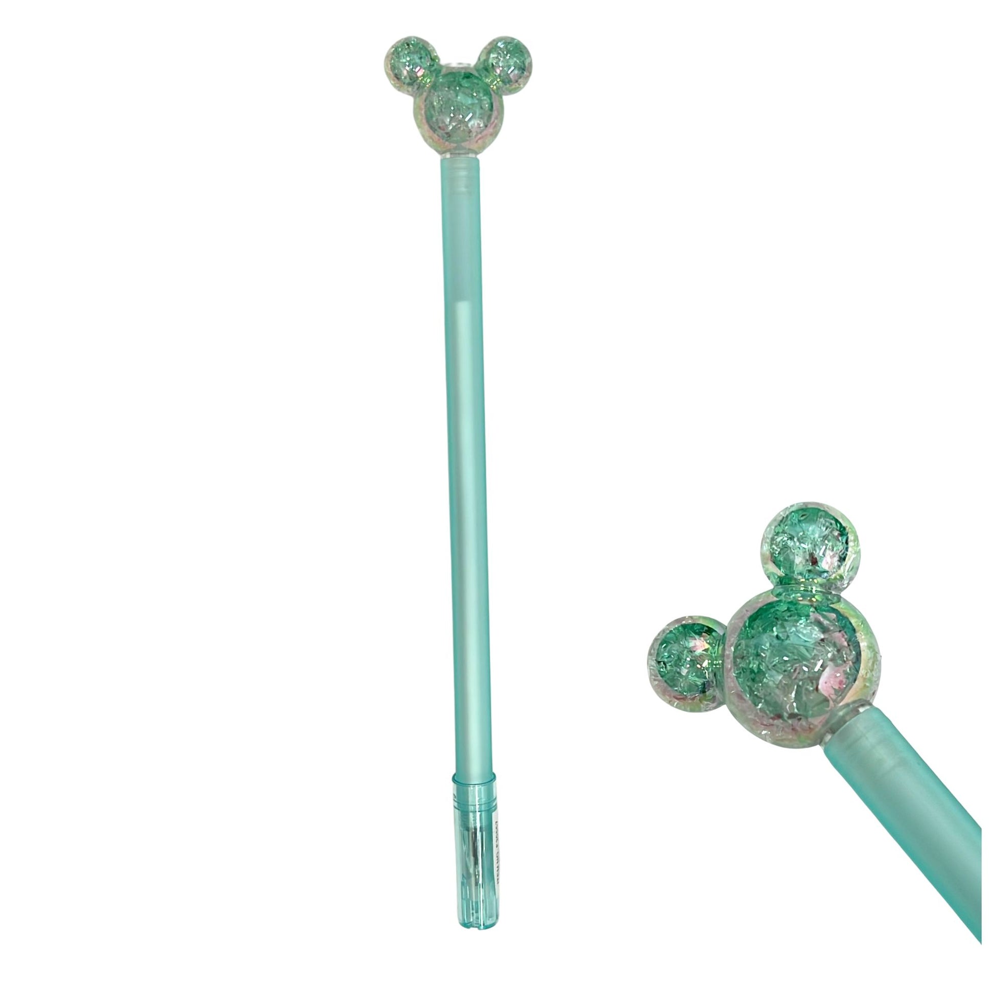 Two turquoise pens with decorative ends on a white background