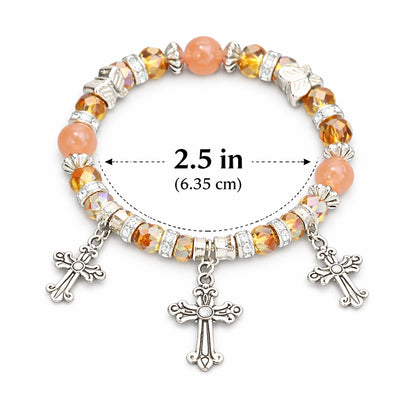 Bracelet with cross charms and colored beads, size indicated as 2.5 inches.