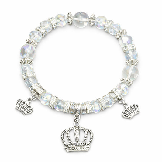 Bracelet with crystal beads and crown charms on a white background