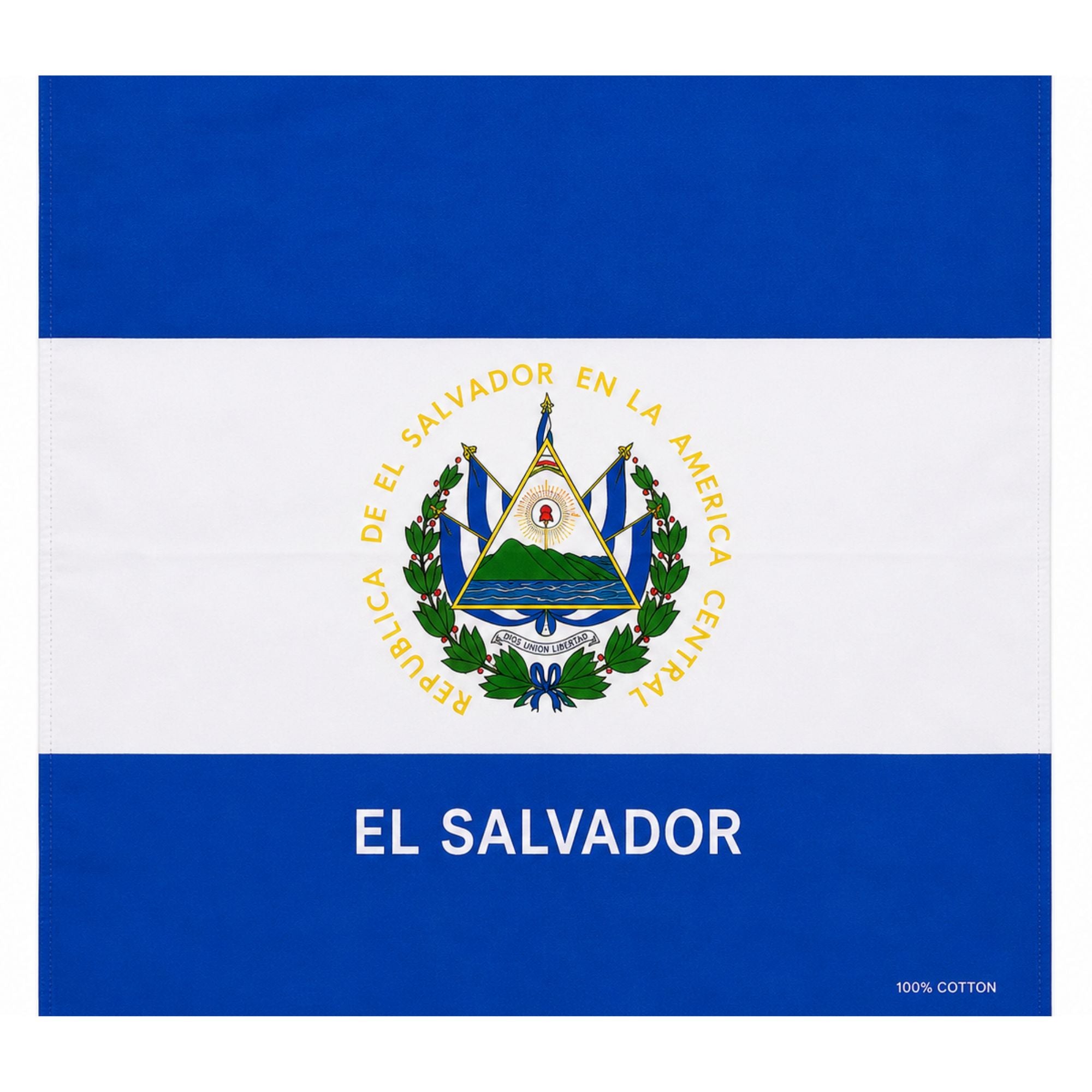 El Salvador flag textile with blue-white-blue horizontal stripes, the national coat of arms centered, and the words 'EL SALVADOR' in white on the lower blue band. Small text in the lower right reads '100% COTTON'.