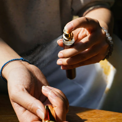 Person using a vape device with a blurred background