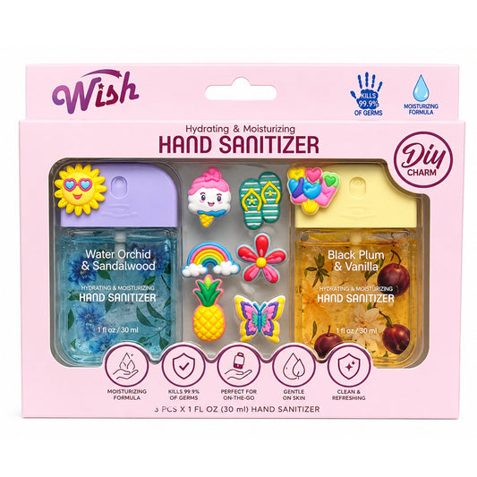 Hand sanitizer set with decorative packaging on a pink background