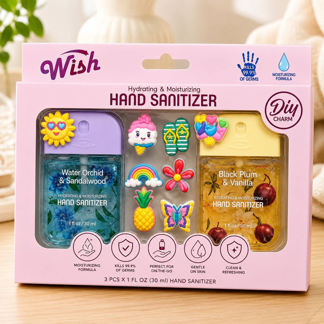 Hand sanitizer set with decorative covers in a 'Wish' branded box on a wooden surface.