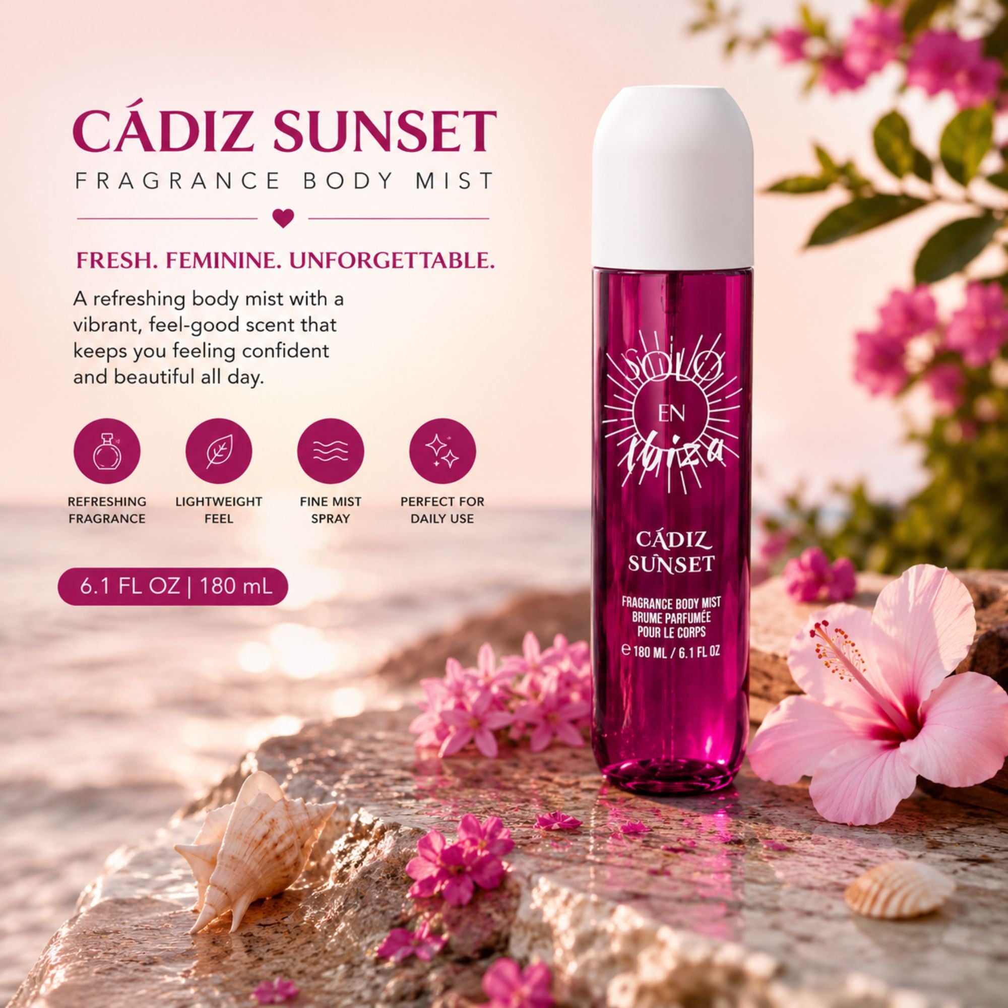 Cádiz Sunset Fragrance Body Mist bottle displayed on a beach-themed background with pink hibiscus flowers, seashells, and rocks. The bottle is a vibrant magenta pink with a white cap, and the background is a soft-focus beach scene.