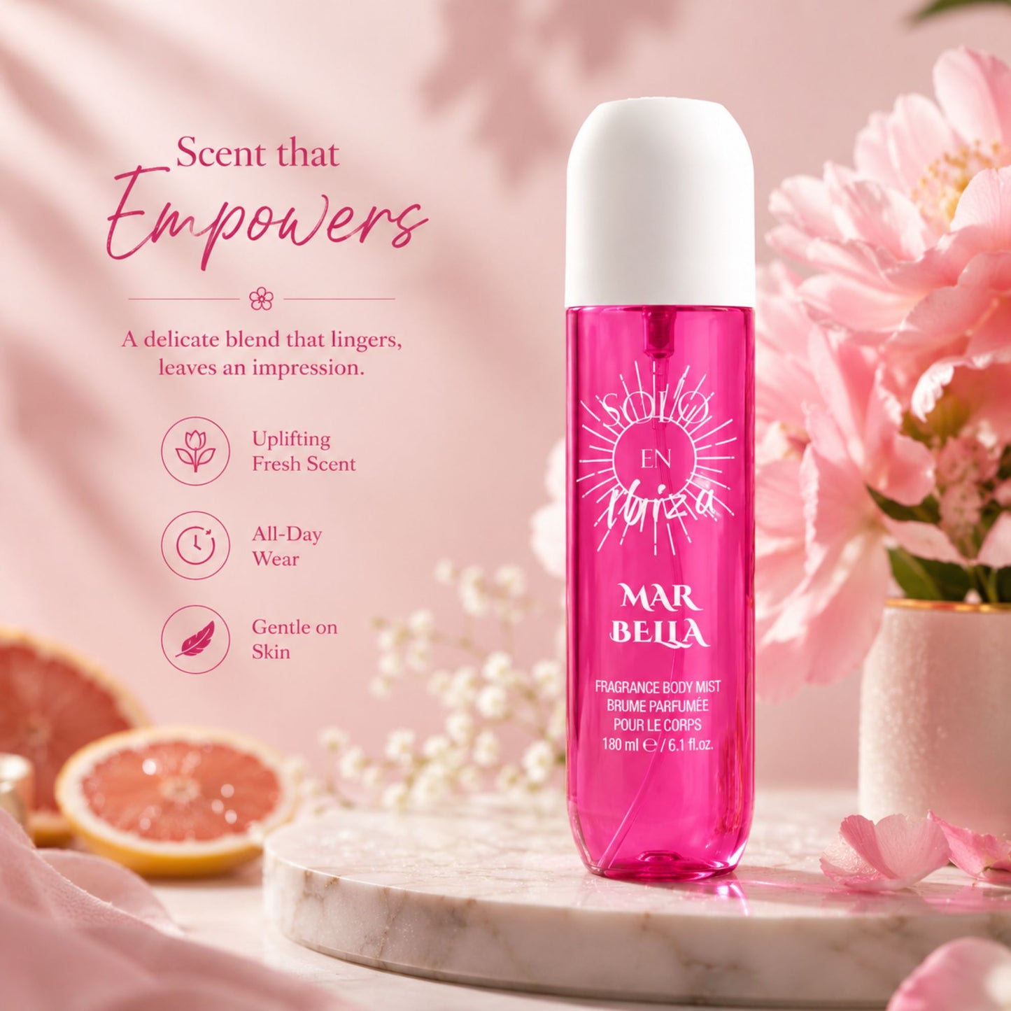 A pink fragrance body mist bottle by Mar Bella stands on a marble slab with pink flowers and citrus slices around it. Text on the left reads 'Scent that Empowers' with product benefits listed below.