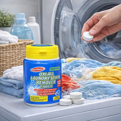 Person adding Oxi-All laundry stain remover tablets to a washing machine with a jar of tablets on a laundry basket.