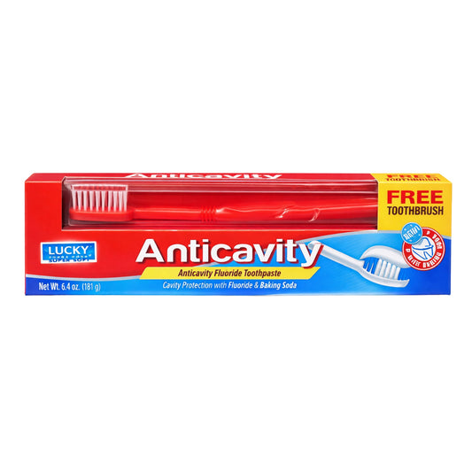 Lucky Anticavity toothpaste packaging with a free toothbrush offer on a white background