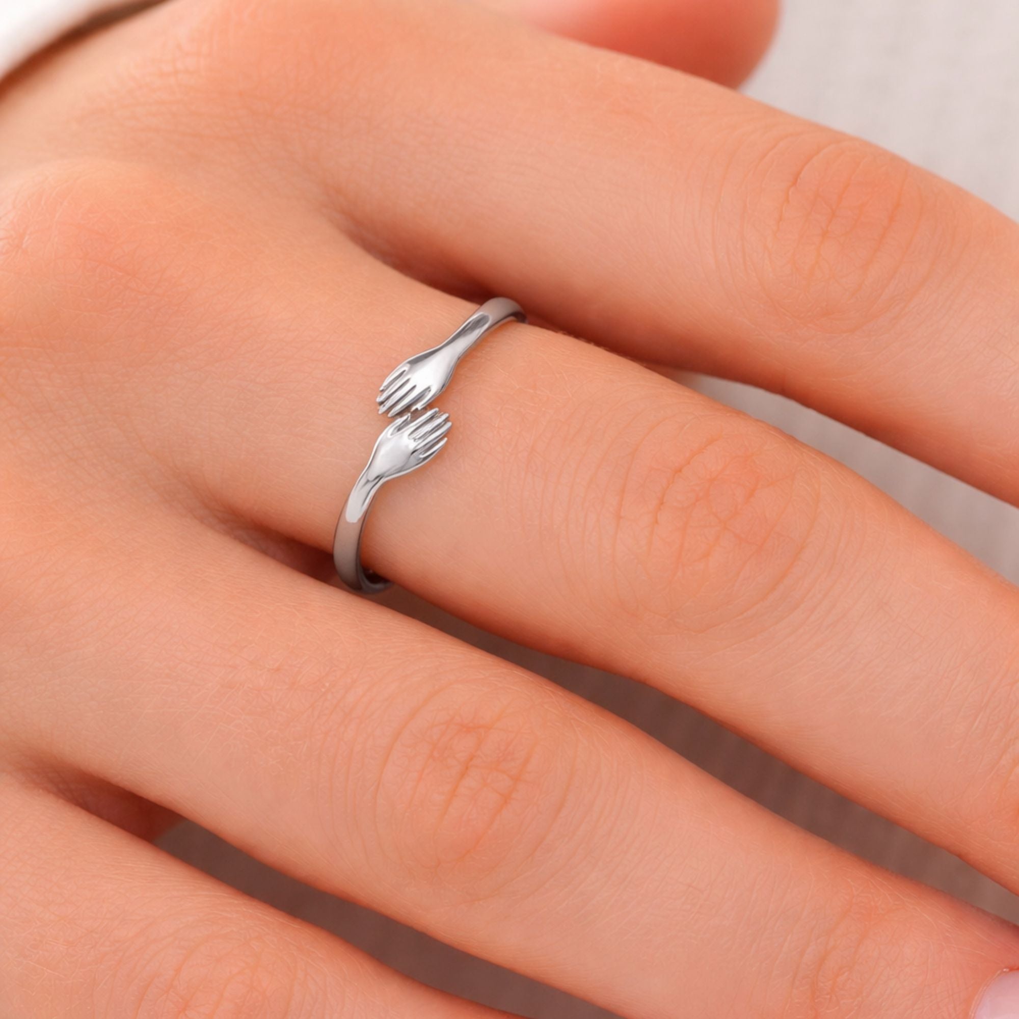 Silver Tone Hug Hands Ring Size 10 lifestyle use image
