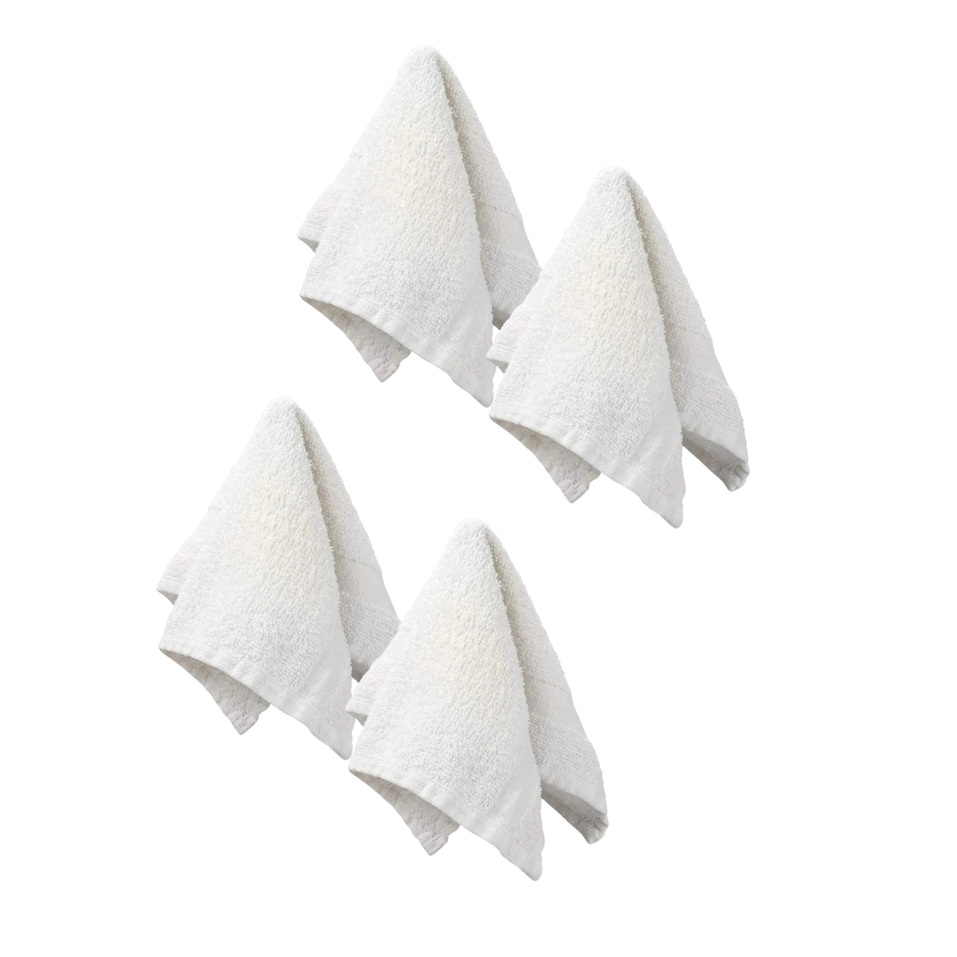 Four white textured towels on a white background