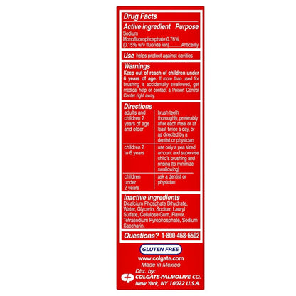 Red label with white text containing drug facts, directions, and contact information on a white background