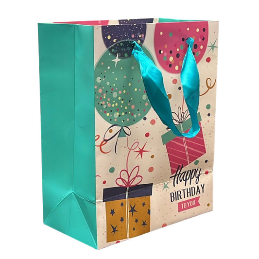 Gift bag with birthday design featuring balloons and presents on a white background