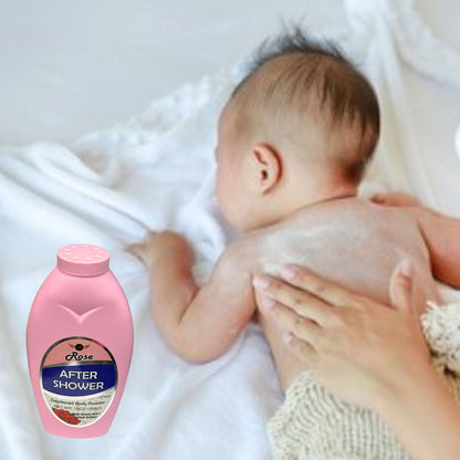 Baby being bathed with a bottle of 'After Shower' product in the foreground