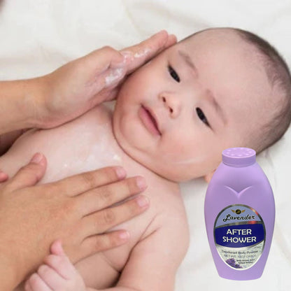 Baby being bathed with a bottle of lavender after shower body powder in the foreground.