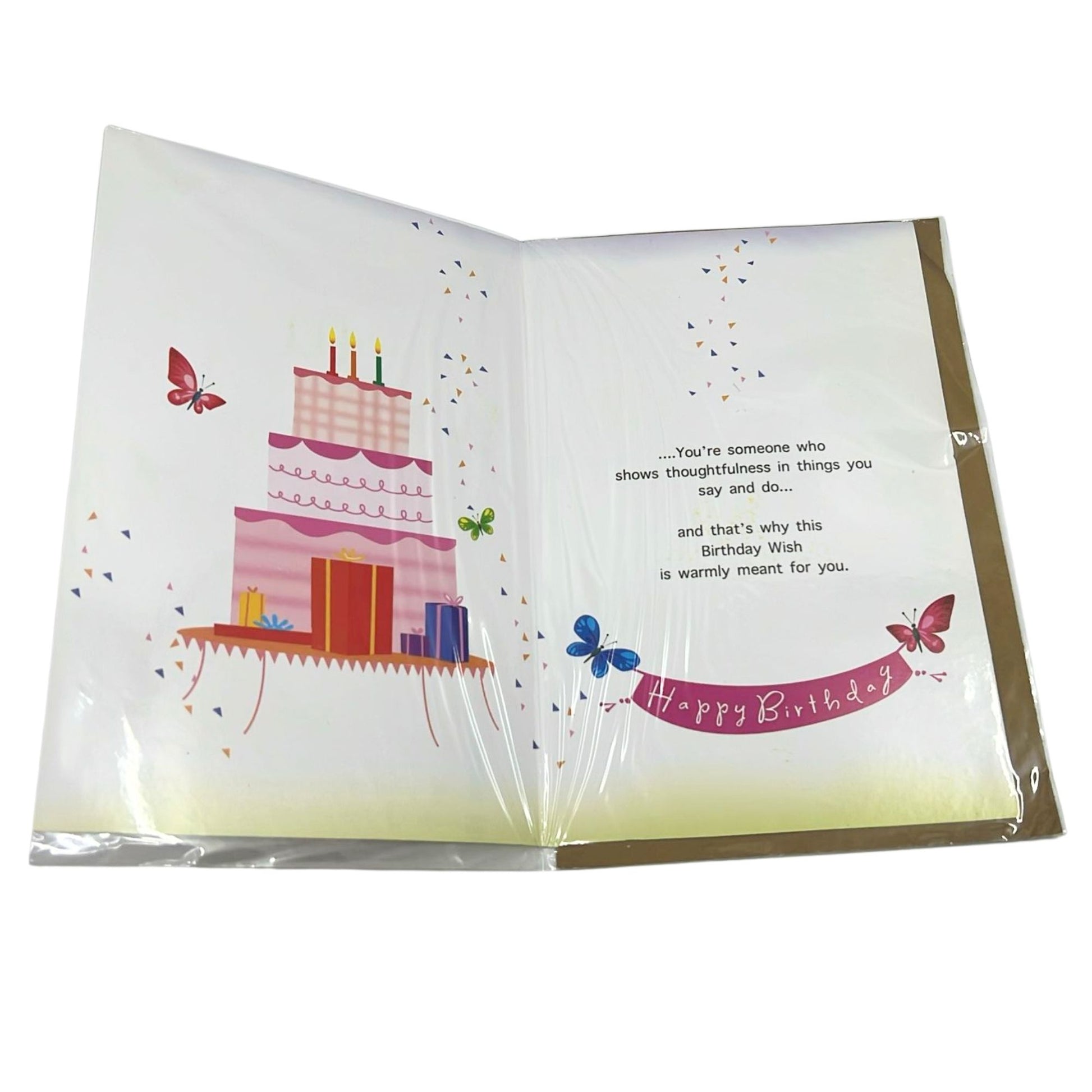 Open birthday card with cake illustration and text on a white background