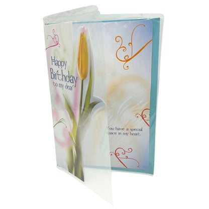 Folded birthday card with floral design and text on a white background