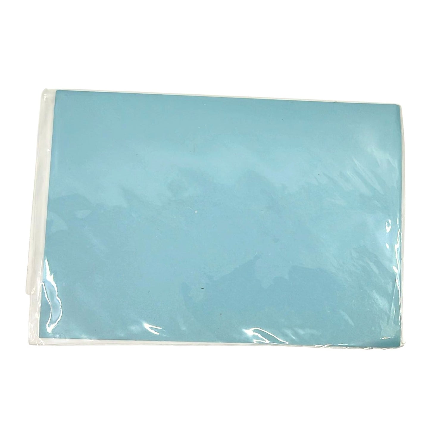 Light blue paper in a clear plastic bag on a white background
