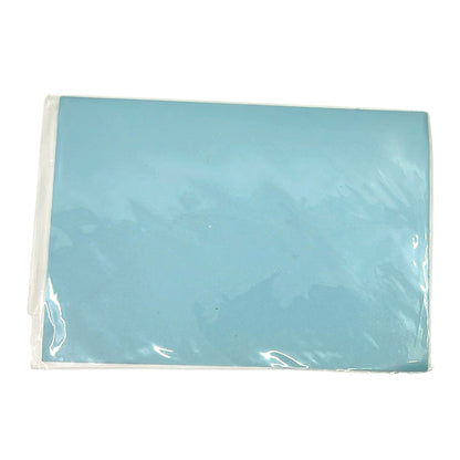 Light blue paper in a clear plastic bag on a white background