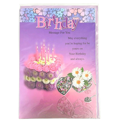 Birthday card with a cake and flowers design on a purple background