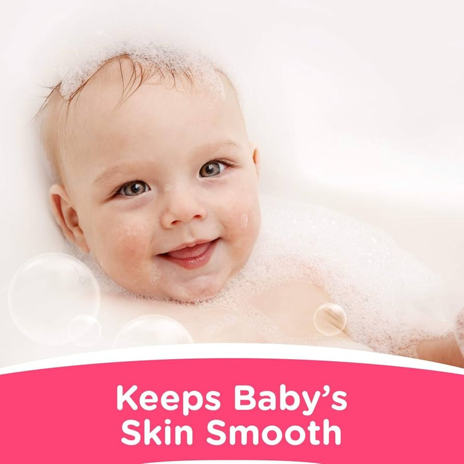 Baby in a bubble bath with a text overlay 'Keeps Baby's Skin Smooth' on a pink banner.