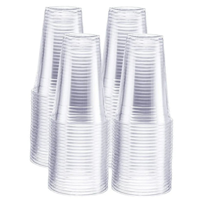 Stacks of clear plastic cups on a white background