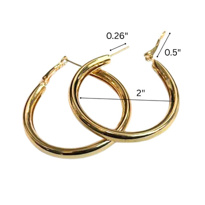 Gold hoop earrings with measurements on a white background