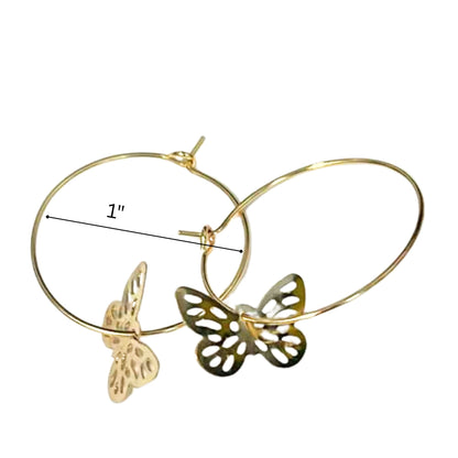 Gold hoop earrings with butterfly designs on a white background