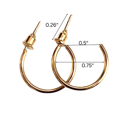 Gold hoop earrings with measurements on a white background
