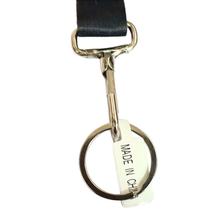Metal keychain with a black ribbon and 'MADE IN CHINA' tag on a white background