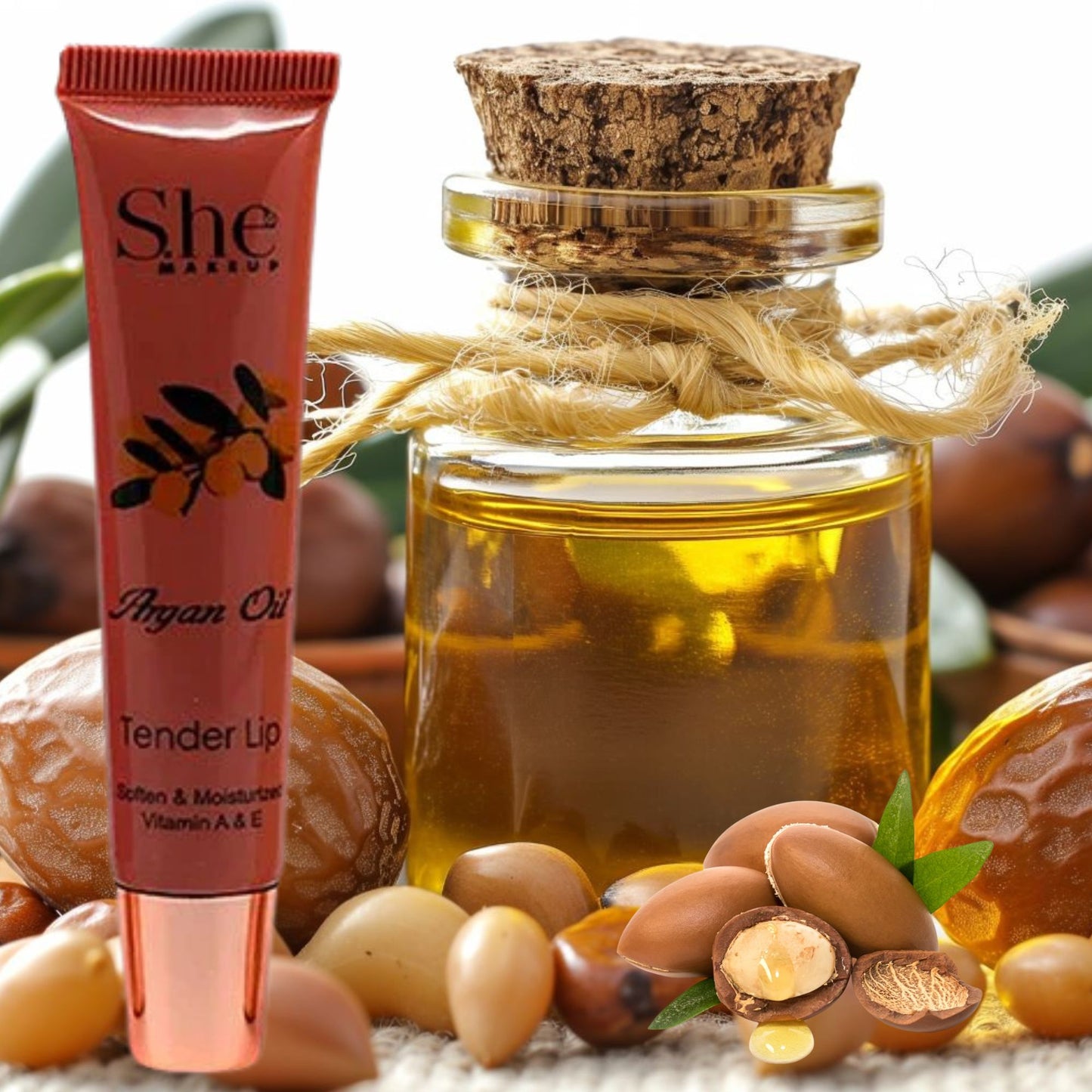 She Mango Argan Oil product with argan nuts and oil bottle on a natural background