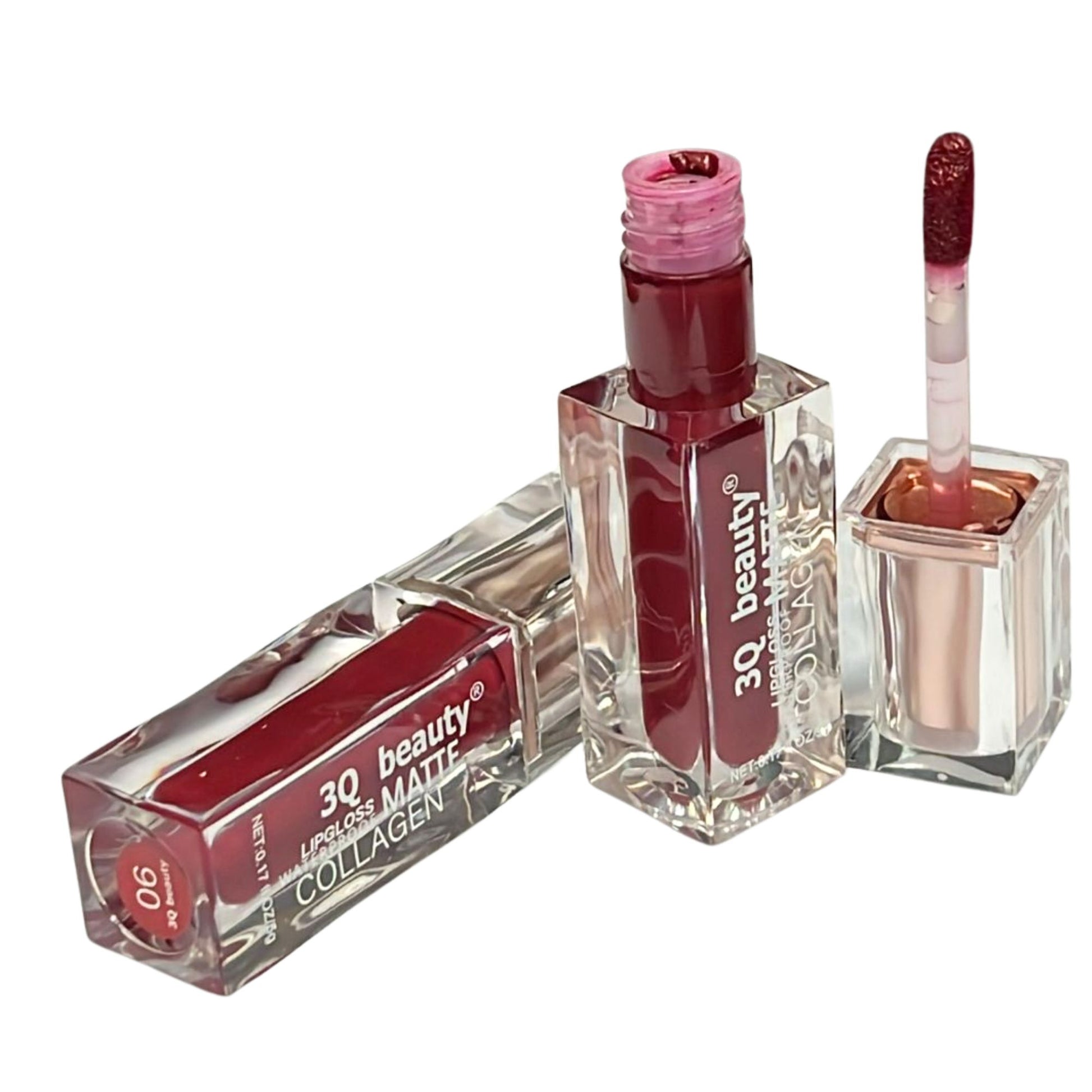 Lip gloss with applicator and packaging on a white background