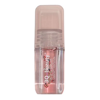 Clear lip oil bottle with pink cap on a white background