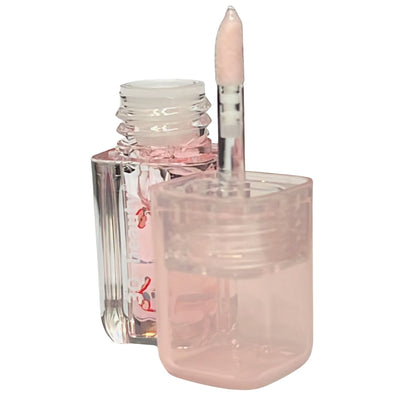 Pink nail polish bottle with a brush on a white background