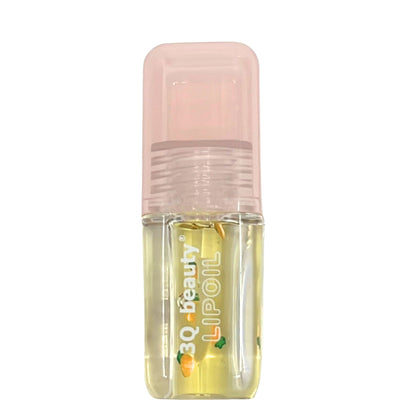 Lip oil with pink cap and clear container on white background