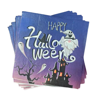 Halloween-themed napkins with ghosts and a haunted house design on a blue and purple gradient background.