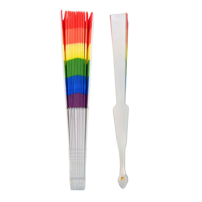 Rainbow-colored fan with a white handle on a white background
